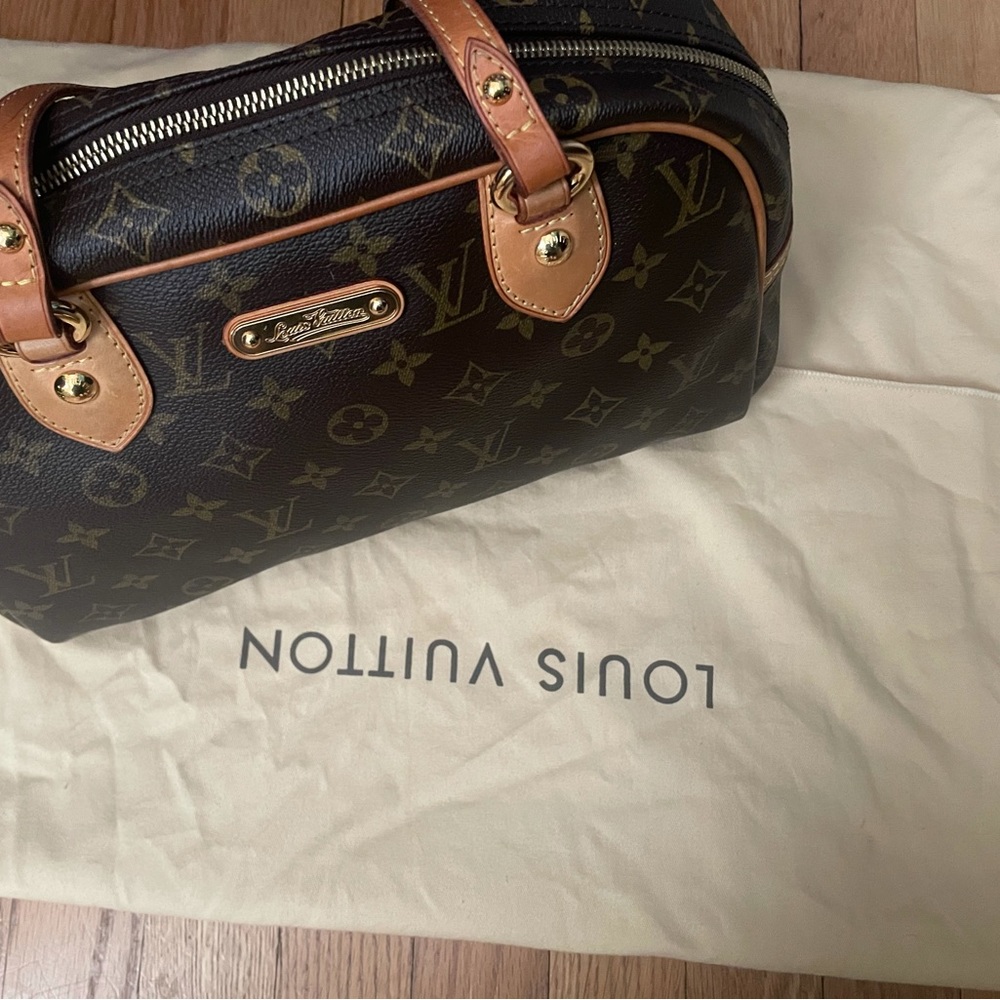 Authentic Louis Vuitton Monogram Montorgueil PM Hand Bag.